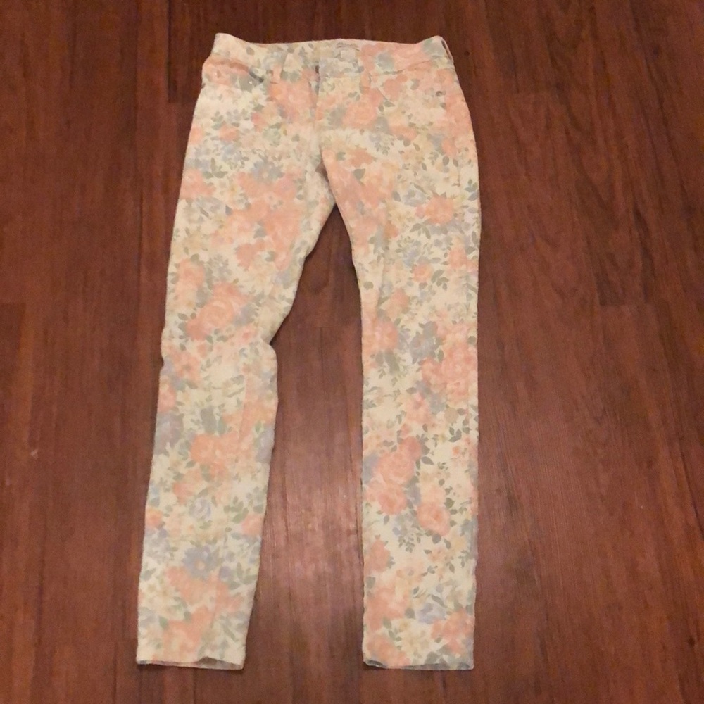 Delia’s size 6 skinny denim. Floral print.
